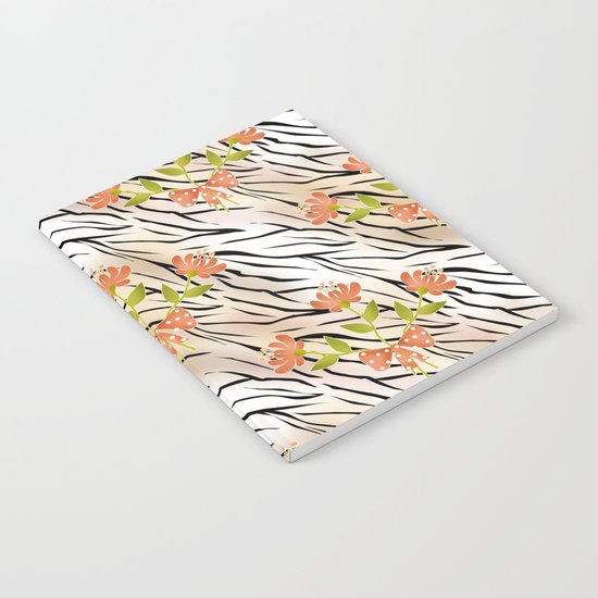 Floral pattern on a tiger background . Notebook