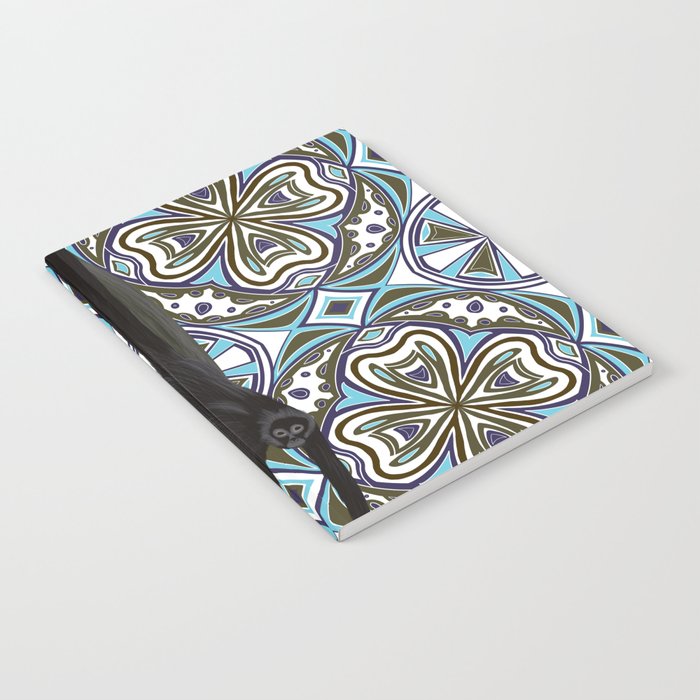 Exotic spider monkey on tree Notebook