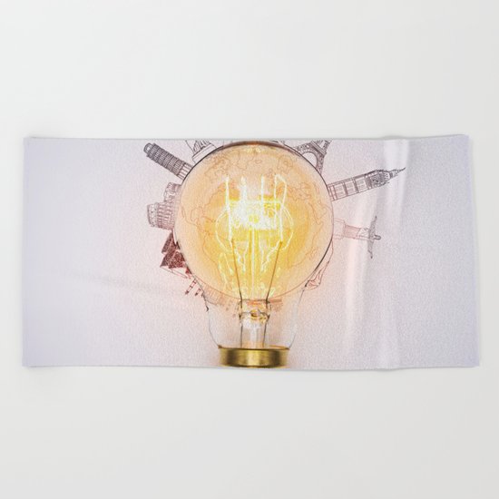 Light bulb with monuments Beach Towel