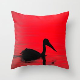 A pelican silhouette, red dawn - landscape Throw Pillow