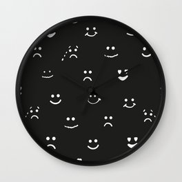 Sad face, happy face, smiley face, eyes heart face, crying face repeated black and white pattern Wall Clock