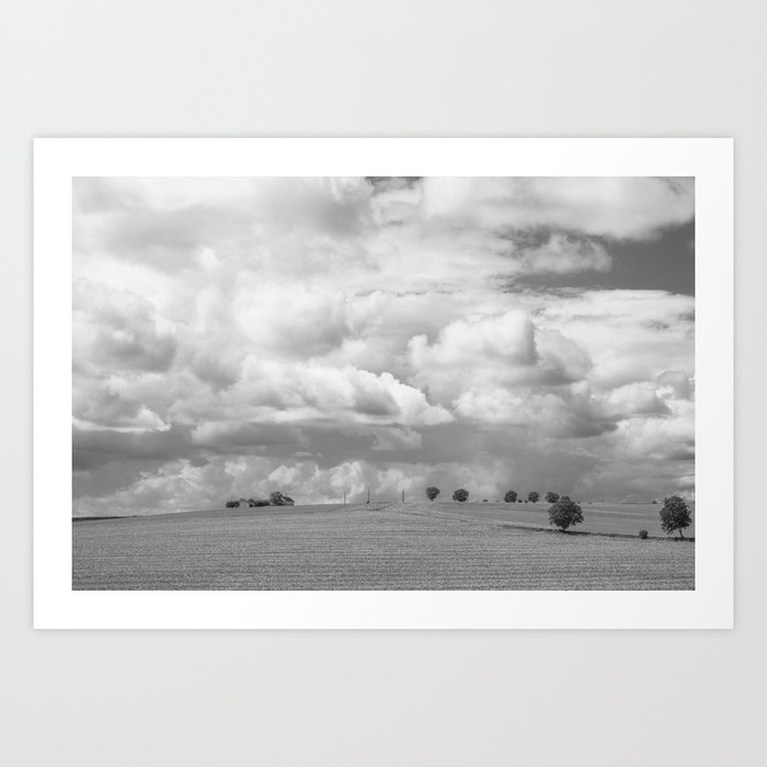 Dark black and white clouds over a Tuscan landscape art print - Italy nature and travel photography Art Print