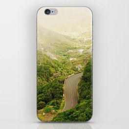 Winding road through bushy hills in Tenerife | Moody atmosphere with low clouds iPhone Skin
