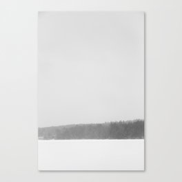 Frozen lake with trees in winter Canvas Print