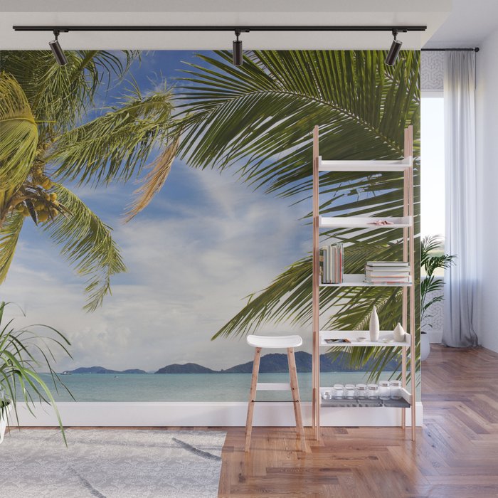 Waving palm trees on white beach Wall Mural