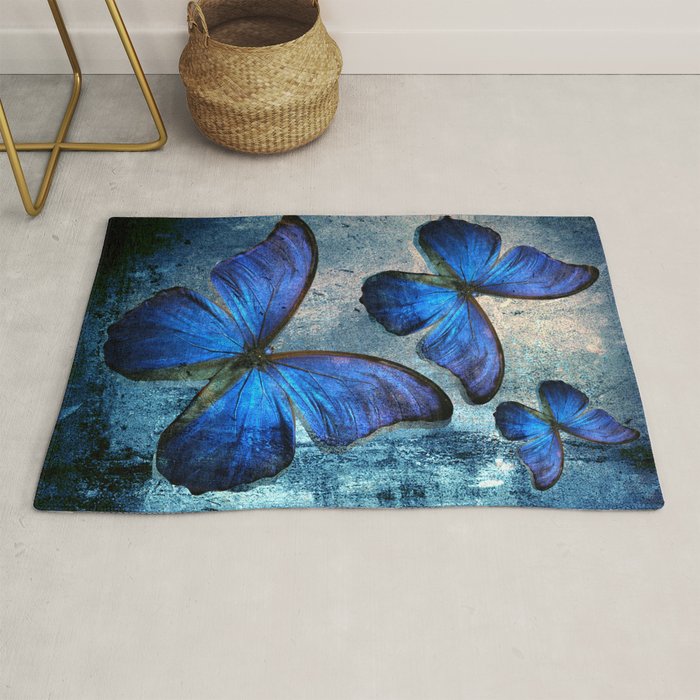 butterfly blue vintage Rug by mark ashkenazi Society6