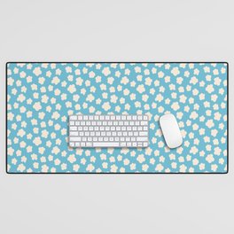 simple small silhouette flowers cream on blue  Desk Mat