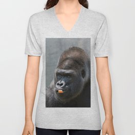 Gorilla looking off to the side while chewing on a carrot piece V Neck T Shirt