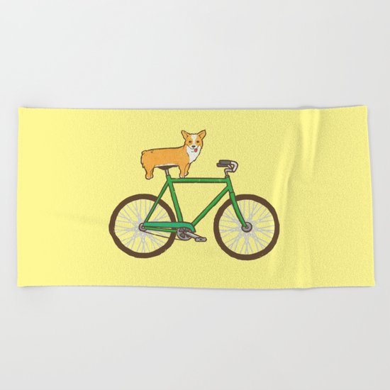 Corgi on a bike Beach Towel