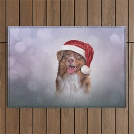 Dog Australian Shepherd in red hat of Santa Claus Outdoor Rug