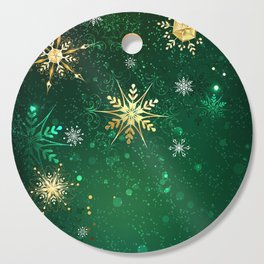 Gold Snowflakes on a Green Background Cutting Board