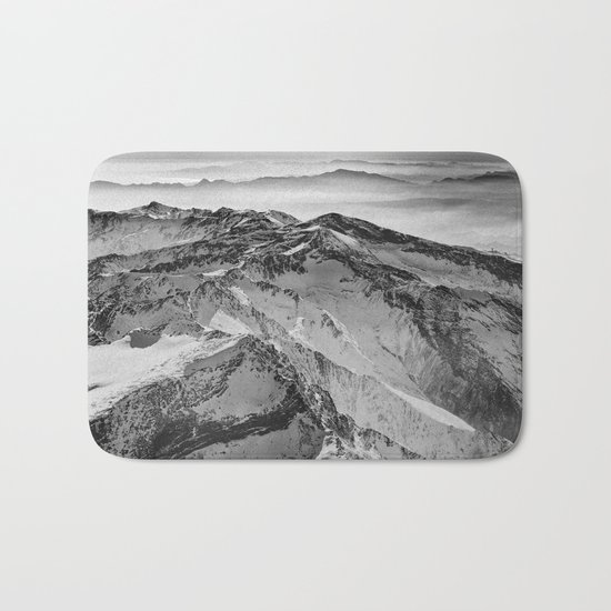 "Flying over wild mountains" Bath Mat