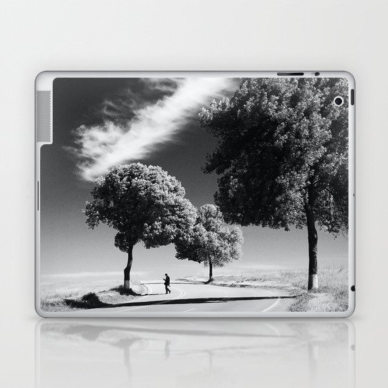 The road less travels; streaks of clouds and trees with lone figure on lonely Tuscan road travel black and white zen photograph - photography - photographs Laptop & iPad Skin
