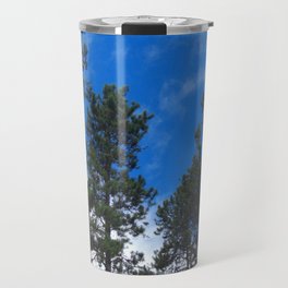 Tree line in a blue sky Travel Mug