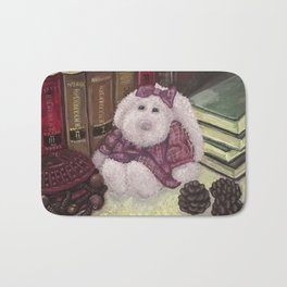 Bunny toy among the old books Bath Mat