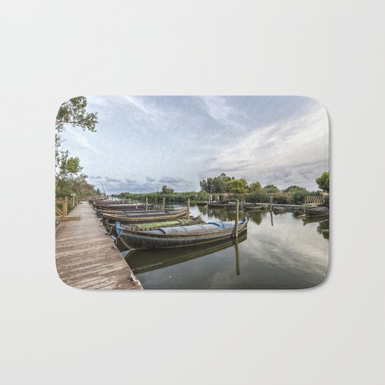 Boats in a lagoon port Bath Mat