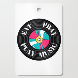 The circular colored illustration shows a black vinyl on which the words eat, pray, play music Cutting Board