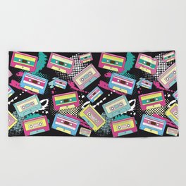 Multi Colored cassettes on a black background seamless pattern Beach Towel