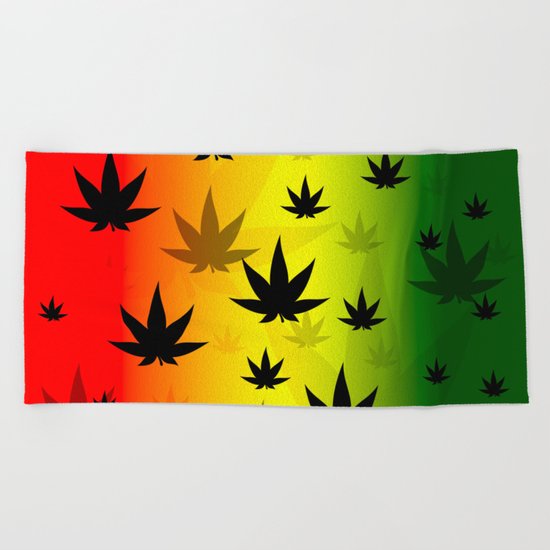 MARIJUANA LEAF DESIGN EMBROIDERED ONTO A DARK BROWN COLOR HAND TOWEL