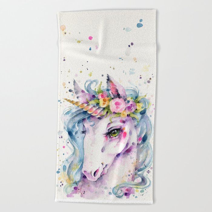 unicorn beach towel in a bag