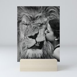 Grouchy Lion being kissed by brunette girl black and white photography Mini Art Print