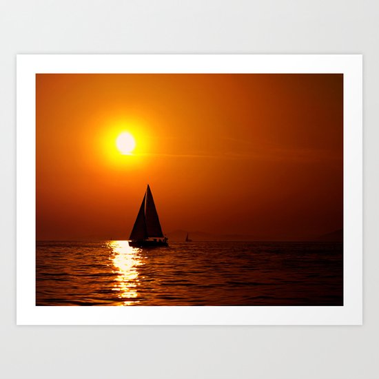 A sailboat at sunset Art Print