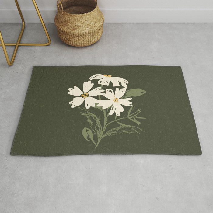 Three flowers on green background Rug