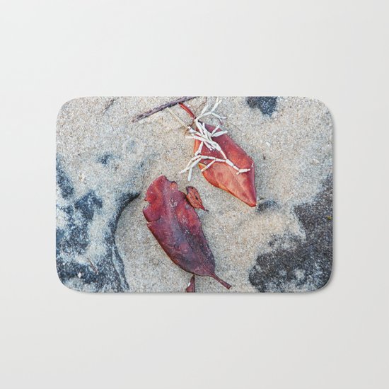 Coralline algae and dead leaf on sand Bath Mat