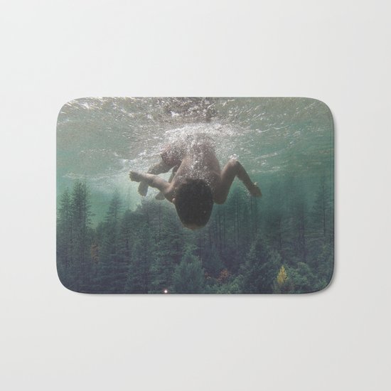 the level inside will rise Bath Mat