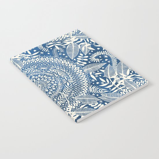 Diamond and Doodle Mandala On Blue Notebook