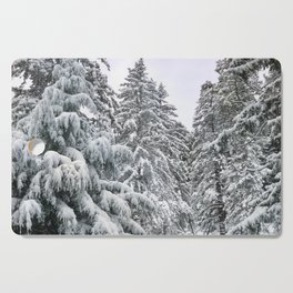 Among the Snowy Pines Cutting Board