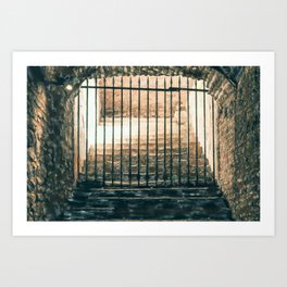 A daunting staircase leading to an iron grid in a medieval dungeon Art Print
