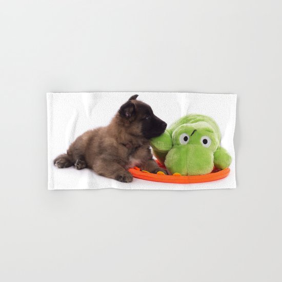 Puppy cuddling green toy Hand & Bath Towel