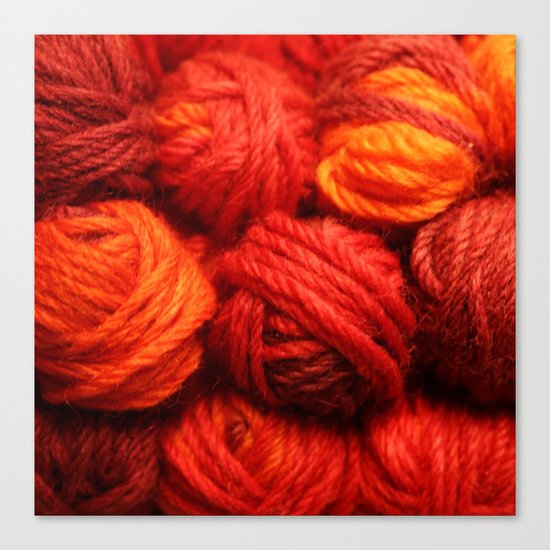 Many Balls of Wool in Shades of Red Canvas Print