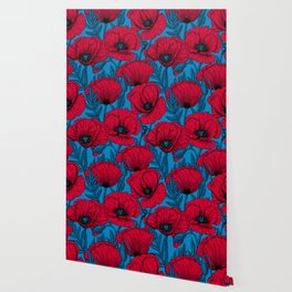 Red poppy garden on blue Wallpaper