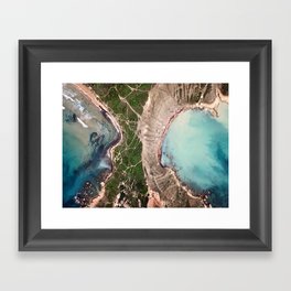 A drone shot of two beaches separated by clay slopes in Malta Framed Art Print