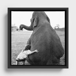 Odd Best Friends, Sweet Little Girl hugging elephant black and white photograph Framed Canvas