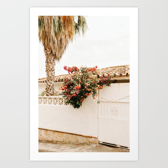 Pink flowers and a palmtree next to the front door - Travel photography - Pastel tones in Europe Art Print