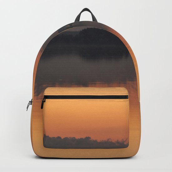 Sunset colors and reflection on the lake surface - magical atmosphere in Scandinavian night Backpack