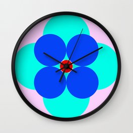 Stylized Flower with Red Blue Contrast and Mint Colored Petals on Light Pink Background Wall Clock