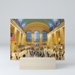 Motion-blurred people moving through Grand Central Station Mini Art Print