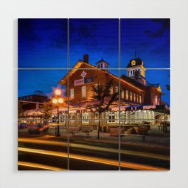 Night view of the '1555 Marché Centre' food market place in the city of Saint-Hyacinthe in summer under an overcast sky. Wood Wall Art