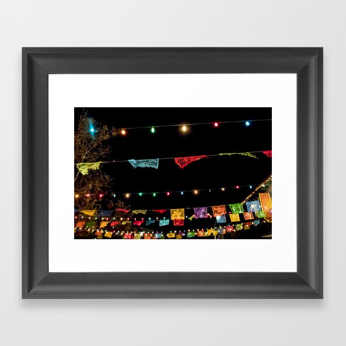 Beautiful Rainbow Colored Paper Flags and Lights Hang across a Day of the Dead Evening Celebration Framed Art Print