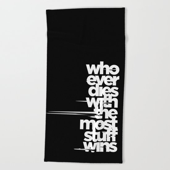 whoever dies with the most stuff wins Beach Towel