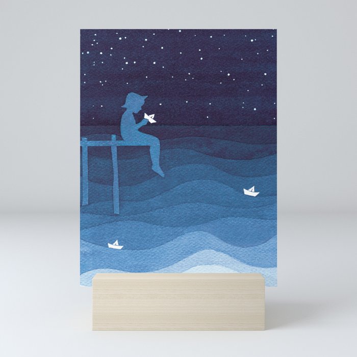 Boy with paper boats, blue Mini Art Print