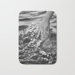 Running hand through the water, under the blue again black and white photograph / art photography Bath Mat