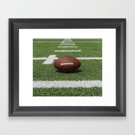 American Football Court with ball on Gras Framed Art Print