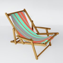 [ Thumbnail: Red, Aquamarine, and Dark Grey Colored Lined/Striped Pattern Sling Chair ]
