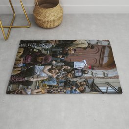 People Sitting on House Stairs, A Area & Throw Rug