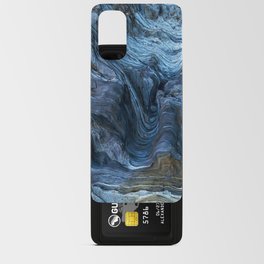 Detail of a rock with variants of blue. Rock full of curves and smooth cuts resulting from the erosive effect of sea. Close up rocks, texture dramatic and colorful erosional water formation. Stone Android Card Case